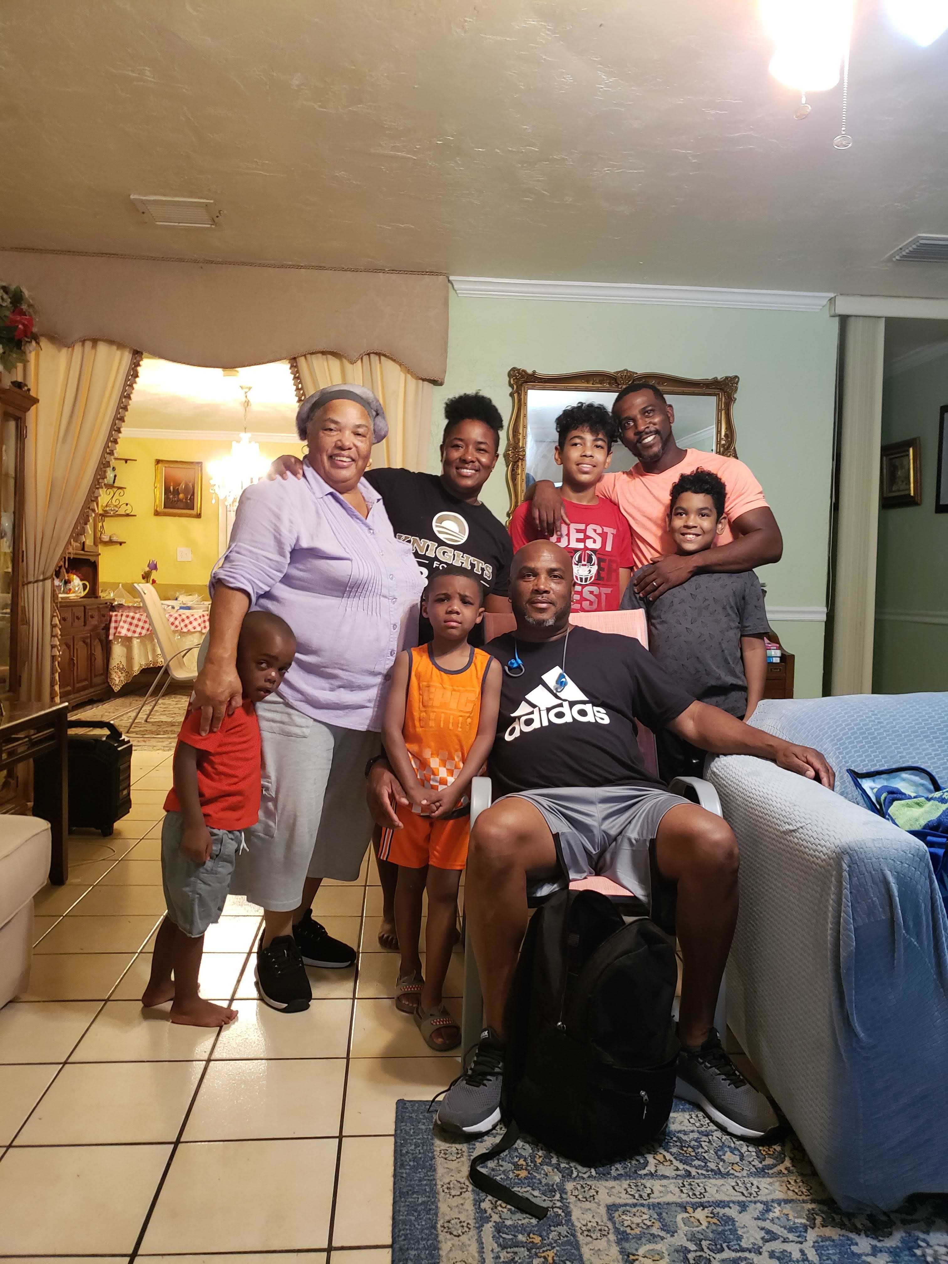 Surrounded by family at home in Goulds